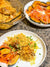 Plated Biryani with acorn squash as a side dish